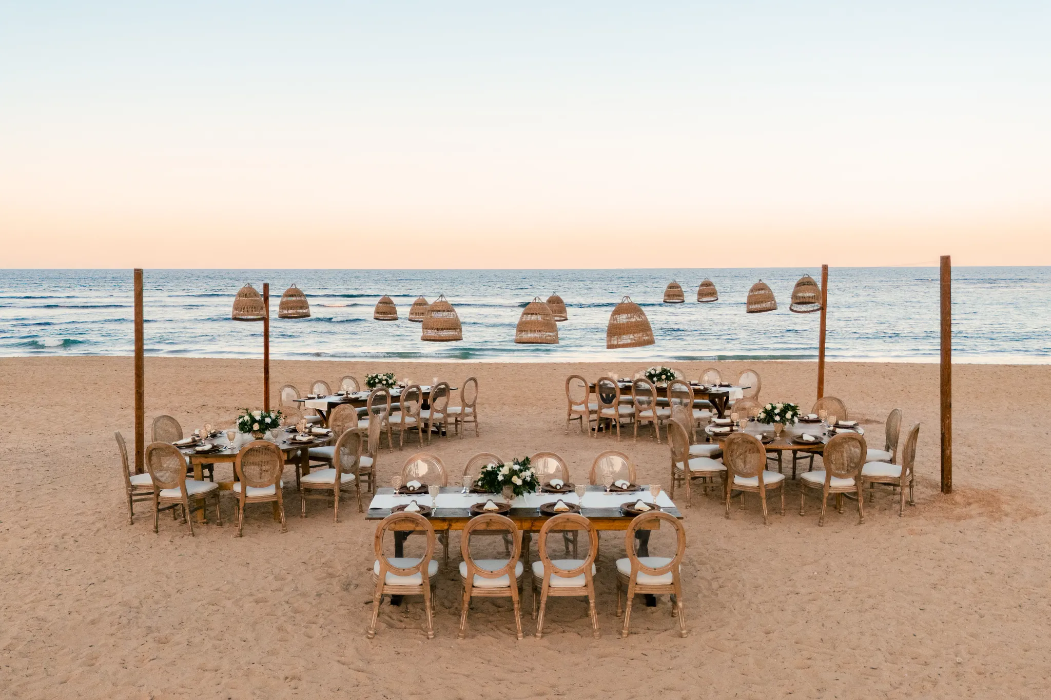 Main beach wedding reception setup with ocean views at Secrets Tides Punta Cana
