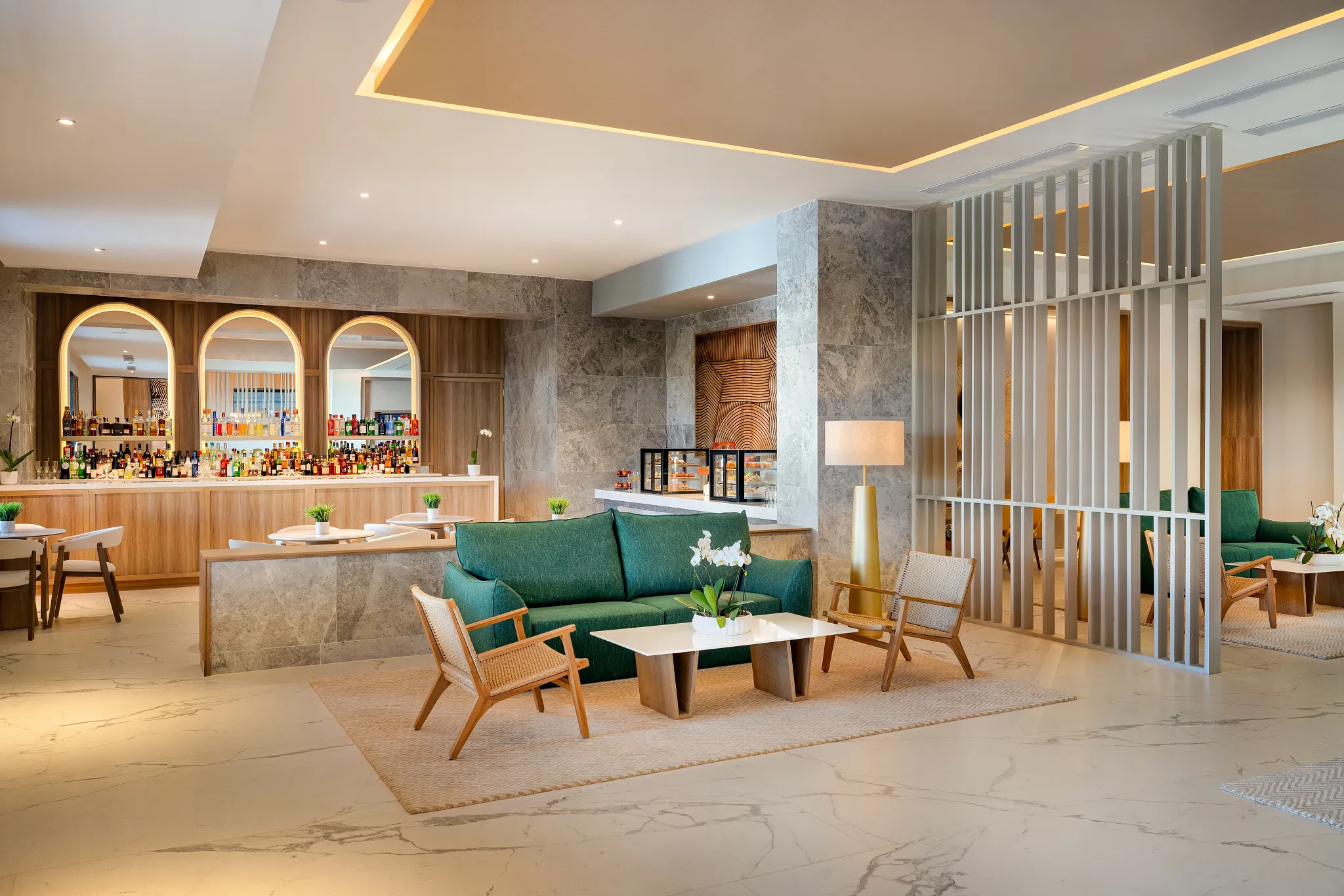 Preferred Club Lounge Bar at Secrets Tides Punta Cana featuring an upscale lounge setting with premium cocktails and light snacks.