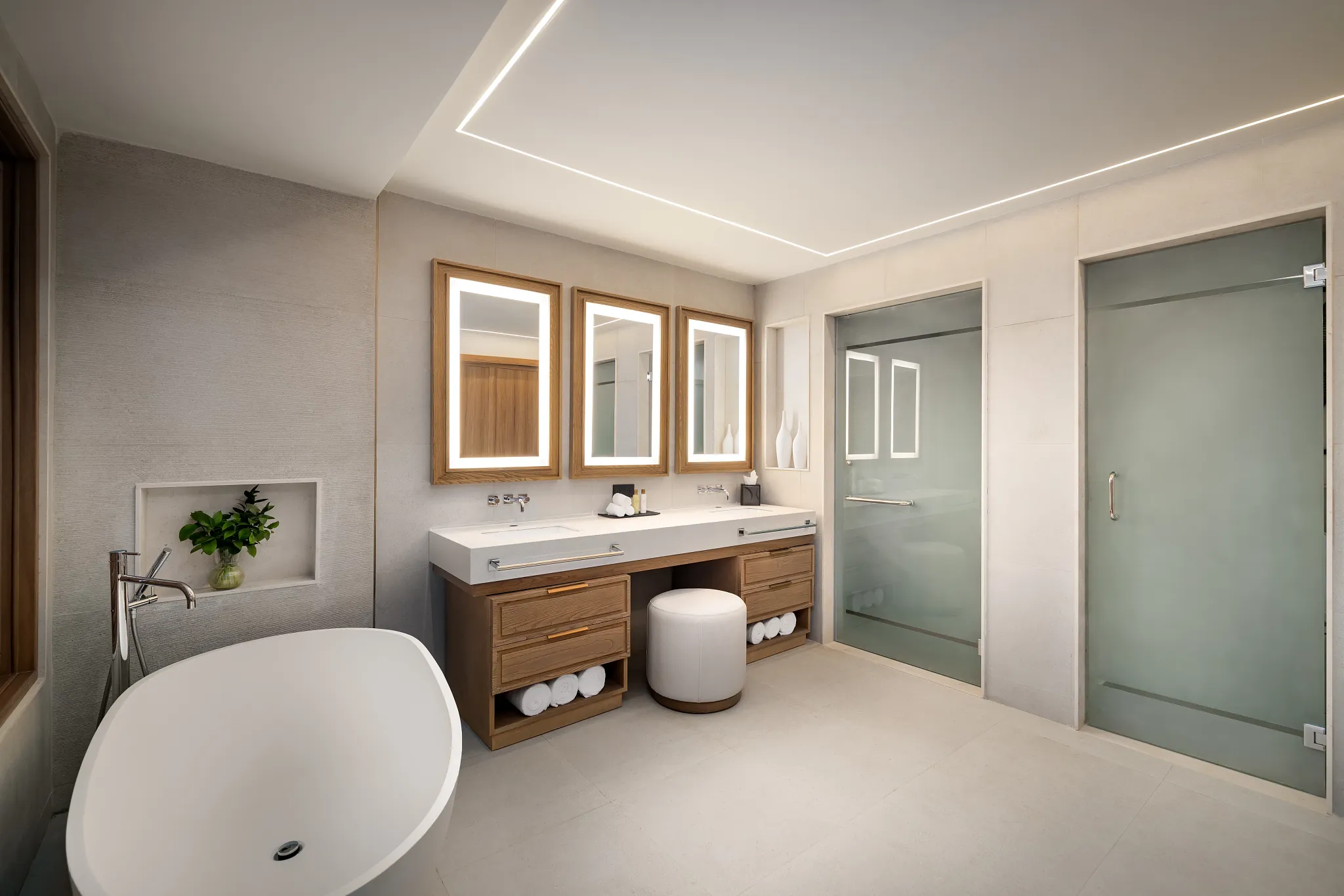 Preferred Club Master Suite Ocean Front Swim Out bathroom with soaking tub and double vanity at Secrets Tides Punta Cana.